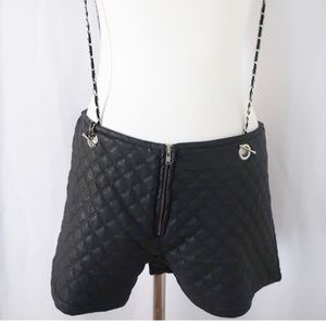 Black quilted overall shorts with chain straps